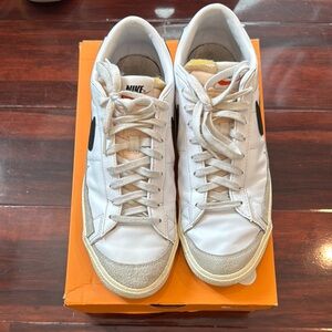 Nike White and Gray Low-Top Sneakers with Lace-Up Design